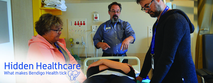 Safe Manual Handling Co-ordinator, Stephen Morley, with Bendigo Health staff practising safe manual handling techniques